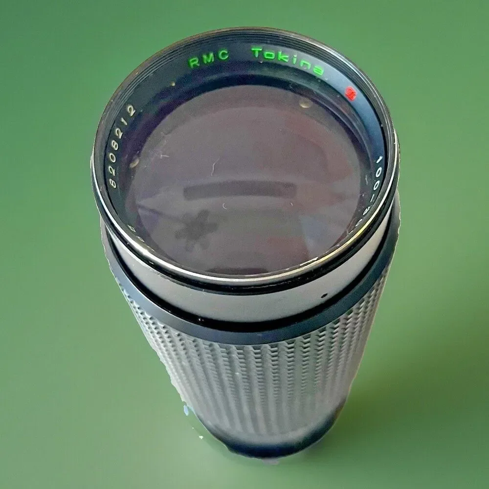 Tokina rmc 100